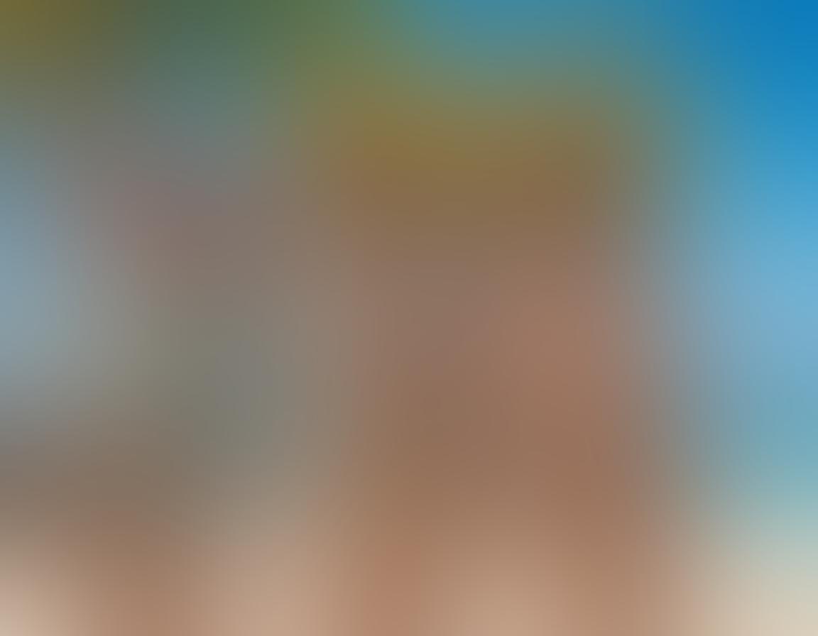 A glamorous beach scene showcasing diverse models of various body types wearing the latest bikini trends. Include vibrant colors and stylish patterns, with elements like sun hats, sunglasses, and beach towels around. The setting should be bright and filled with tropical palm trees and a sparkling ocean in the background, evoking a sense of luxury and sensuality. Capture the essence of summer fashion with a lively atmosphere. vibrant colors. super-realistic.